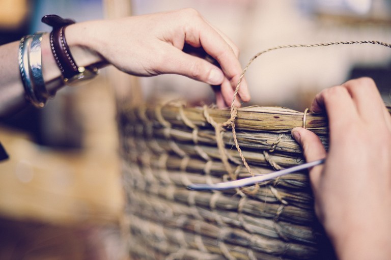 Gemma Stratton weaving Orkney chair back with ti kouka cabbage tree leaves. Image by Justyn Denney.jpg